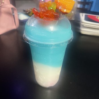 The Candy Shop Memphis - a blue and white drink with gummy bears on top - Candy Stores Near Me - Memphis, Tennessee The Candy Shop Memphis - a blue and white drink with gummy bears on top - Candy Stores Near Me - Memphis, Tennessee
