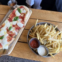Margarita flatbread and truffle fries Margarita flatbread and truffle fries
