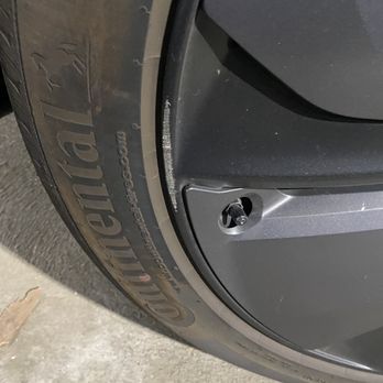Elevance - Tesla Model Y before with rash - Vehicle Wraps Near Me - Cypress, California