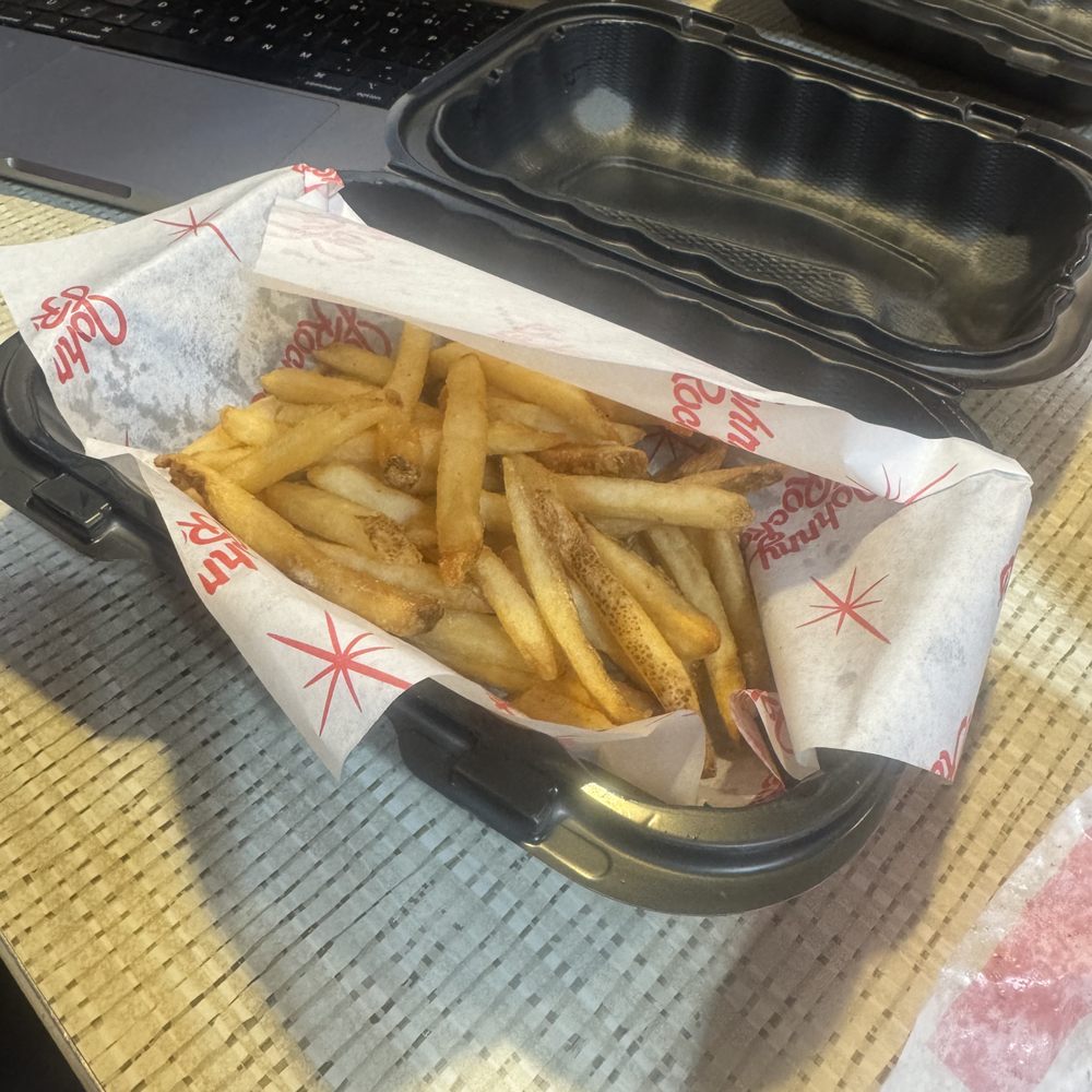 Fries in black plastic