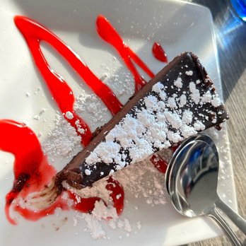 Hook & Vine - Kitchen and Bar - One of our favorite dessert here, chocolate flourless cake. - Seafood Near Me - North Beach, Maryland Hook & Vine - Kitchen and Bar - One of our favorite dessert here, chocolate flourless cake. - Seafood Near Me - North Beach, Maryland
