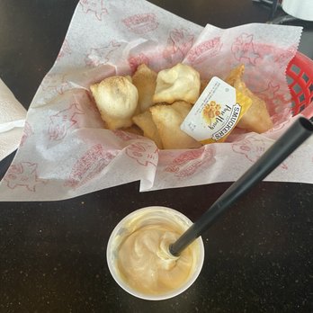 Fuzzy's Taco Shop - Sopapilla bites with honey and frosting mixed! - Tex-Mex Near Me - Casper, Wyoming Fuzzy's Taco Shop - Sopapilla bites with honey and frosting mixed! - Tex-Mex Near Me - Casper, Wyoming