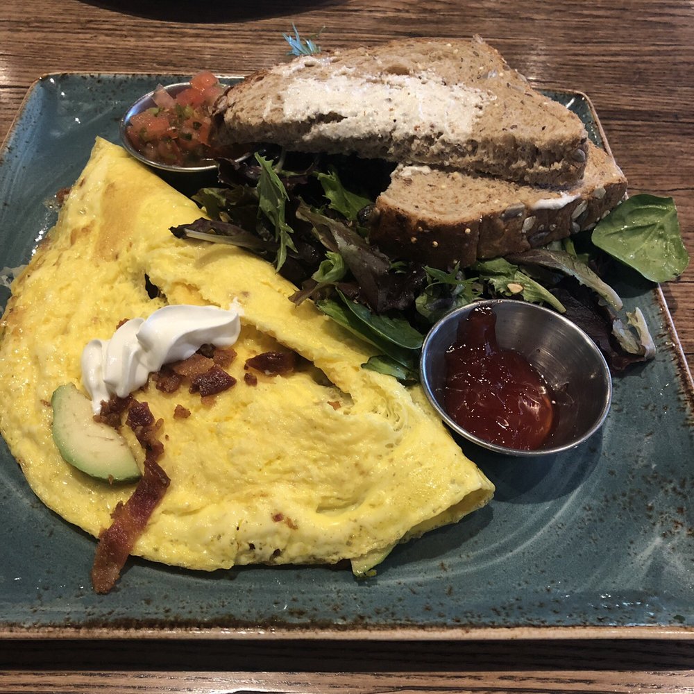 First Watch - Bacon,cheese, avocado omelette. - Breakfast & Brunch Near Me - Houston, Texas First Watch - Bacon,cheese, avocado omelette. - Breakfast & Brunch Near Me - Houston, Texas