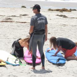 Surfin Fire Surf School - Waxing down the boards