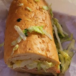 Monkey's Subs - Tuna on wheat hold the onions, oil, and vinegar. 1/2 a 12". Half now, half later.