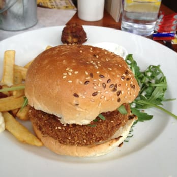 The Sussex - Harissa Burger with chips and salad - Pubs Near Me - Brighton, BNH The Sussex - Harissa Burger with chips and salad - Pubs Near Me - Brighton, BNH