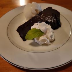 Kalvas Restaurant - Flourless chocolate torte with whipping cream and vanilla ice cream