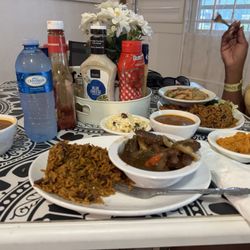 Alba’s Bar & Restaurant - Pepper steak with slaw, beans and rice and peas. Conch with stuffing, beans and rice and peas.