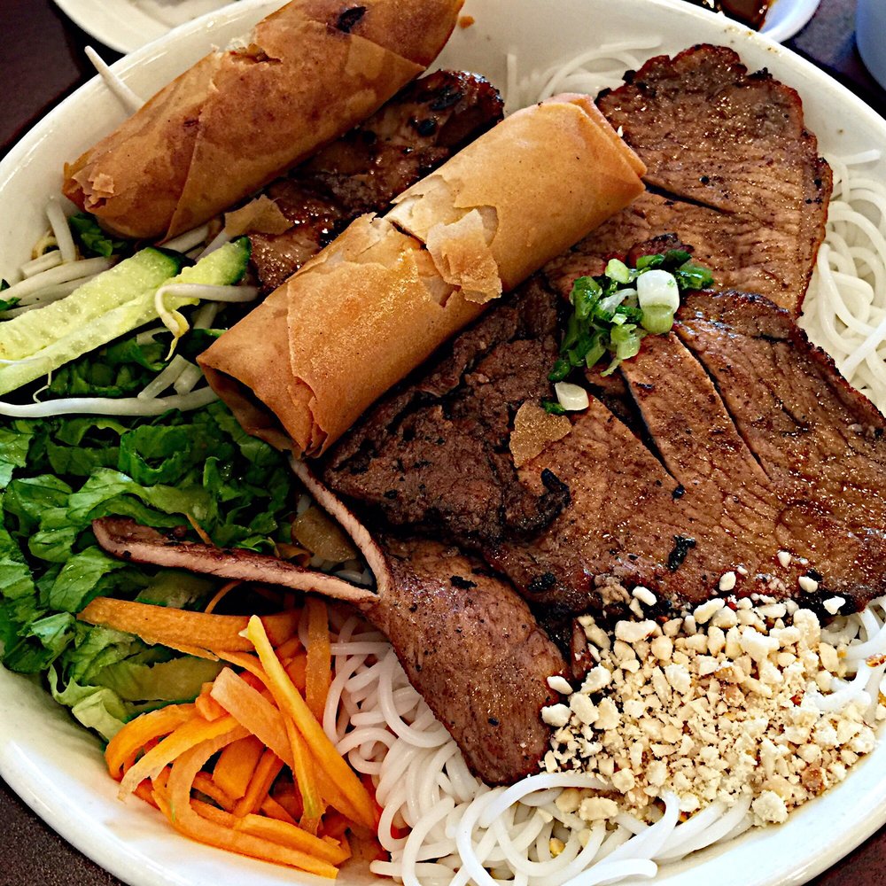 Pho Phi - B5 classic Bun Thit. Decent deal for $9. Dunno why they don't slice the pork all the way through. But you do get two egg rolls. - Vietnamese Near Me - Austin, Texas