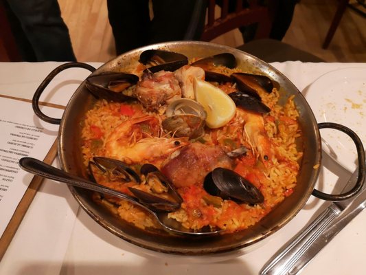 Photo of Club Espagnol de Québec - Montréal, QC, CA. a bowl of seafood and rice