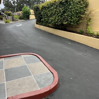 Best Western Plus Monterey Inn - Tight corner to get down to the lower lot - Hotels Near Me - Monterey, California