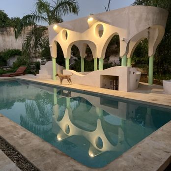 In-Site Design - Large pool and pergola above the hot tub. Design and construction supervision of this concrete structure at Hotel Calle Ouvert, Merida, MX - Architects Near Me In-Site Design - Large pool and pergola above the hot tub. Design and construction supervision of this concrete structure at Hotel Calle Ouvert, Merida, MX - Architects Near Me