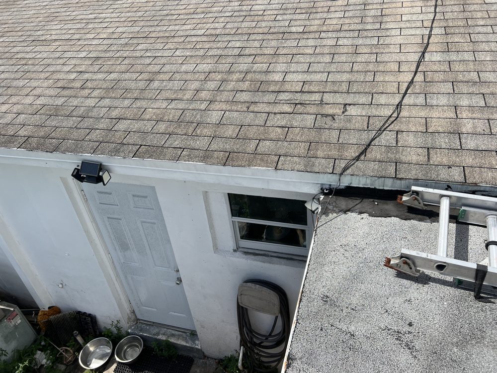 Slide of Combat Roofing Services