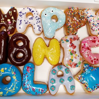 Howdy Donuts - a box of doughnuts - Donuts Near Me - Austin, Texas
