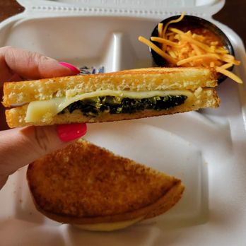 Fruits of Labor - a person holding a sandwich in a styrofoam container - Cafes Near Me - Montgomery, West Virginia Fruits of Labor - a person holding a sandwich in a styrofoam container - Cafes Near Me - Montgomery, West Virginia