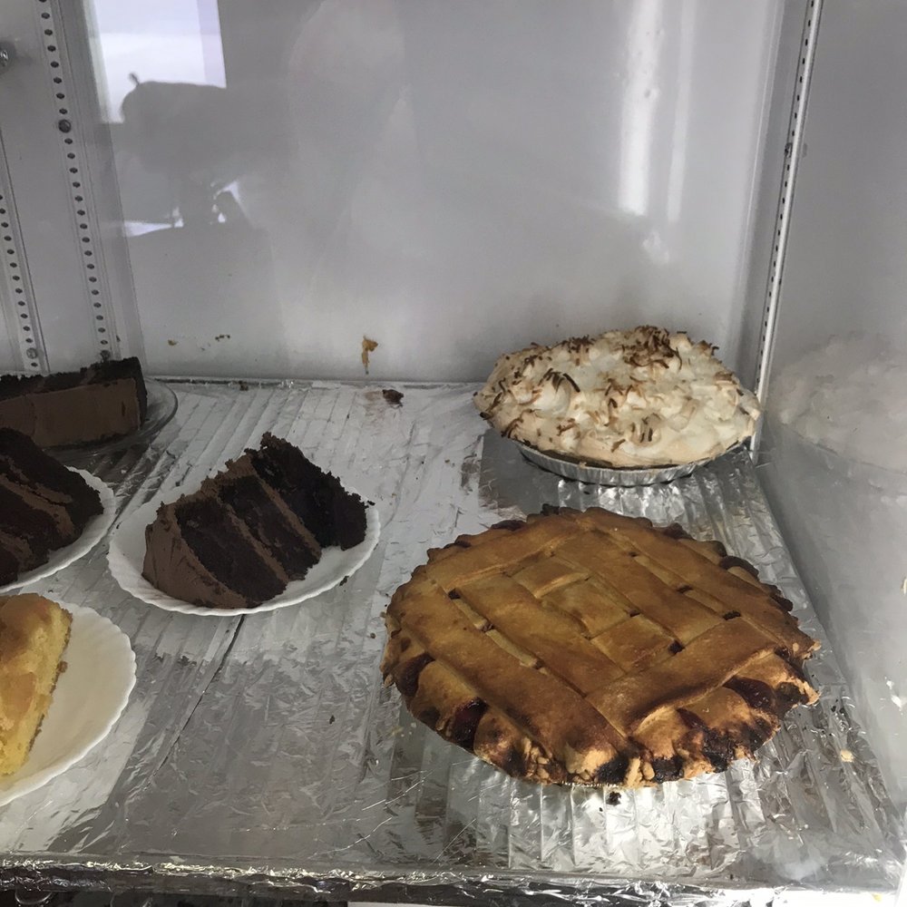 Gg's Corner Cafe - Mouthwatering Pie and cake display. - Cafes Near Me - Marion, Texas