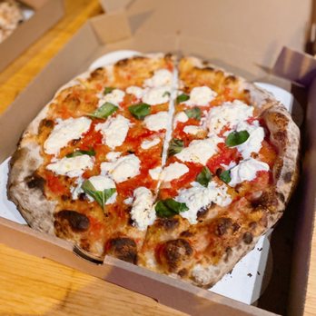 Razza - Burrata: tomato sauce, burrata, garlic, basil - Pizza Near Me - Jersey City, New Jersey Razza - Burrata: tomato sauce, burrata, garlic, basil - Pizza Near Me - Jersey City, New Jersey
