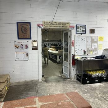 Lejeune's Bakery - I wasn't allowed inside the production room but I was able to watch from this door - Bakeries Near Me - Jeanerette, Louisiana Lejeune's Bakery - I wasn't allowed inside the production room but I was able to watch from this door - Bakeries Near Me - Jeanerette, Louisiana