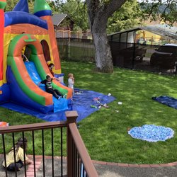 Fiesta Party Rentals - Rainbow bounce house