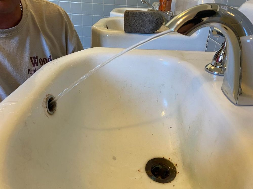 Slide of Woods Plumbing & Drain Cleaning