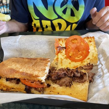 Mancino's Pizza & Grinders - Roast Beef Grinder--seems a little light on the roast beef - Pizza Near Me - Portage, Michigan Mancino's Pizza & Grinders - Roast Beef Grinder--seems a little light on the roast beef - Pizza Near Me - Portage, Michigan