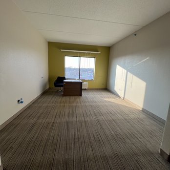 Moreno Bros Construction - Hotel guest room. Carpet and trim installation. Painted walls and ceiling. - General Contractors Near Me