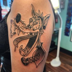 Evolution Tattoo