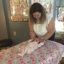 Balanced Body Chiropractic & Massage - Adjusting babies