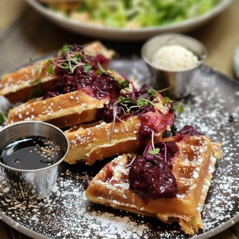 Café Fig - Waffles & berries, ceasar salad with salmon in the back - Cafes Near Me - Los Angeles, California