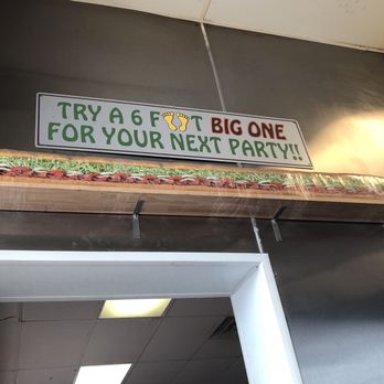 Larry's Giant Subs - a sign that says try a 6 foot big one for your next party - Delis Near Me - Athens, Georgia Larry's Giant Subs - a sign that says try a 6 foot big one for your next party - Delis Near Me - Athens, Georgia