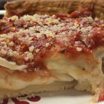 Giordano's - Cross section of a slice: You can easily appreciate how much the cheese and sauce deliciousness comprises the thickness in each slice - Pizza Near Me - Chicago, Illinois Giordano's - Cross section of a slice: You can easily appreciate how much the cheese and sauce deliciousness comprises the thickness in each slice - Pizza Near Me - Chicago, Illinois