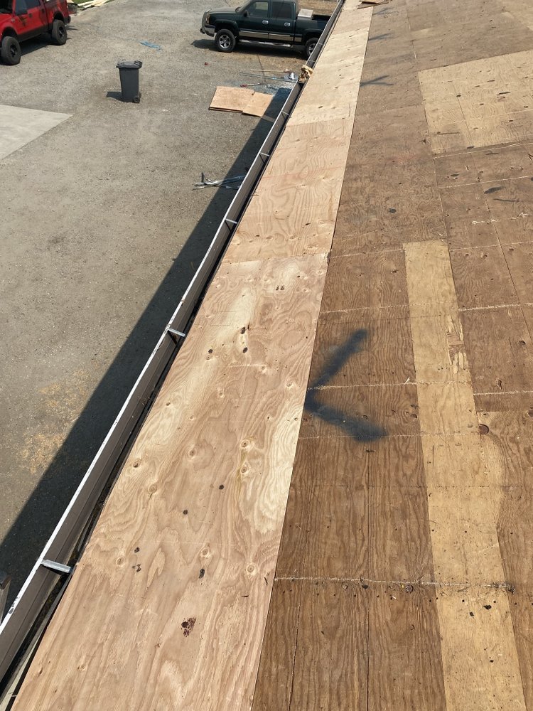 Slide of Rebel Roofing