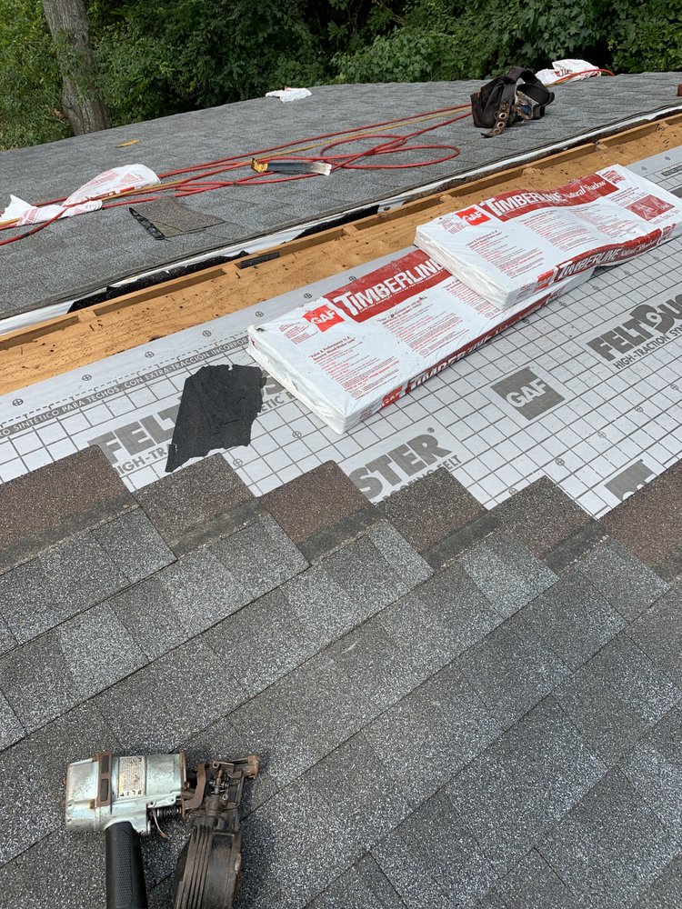 Slide of Azteca Roofing