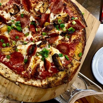 The Redd Dog - Otis pizza & side of fries - Bars Near Me - Tacoma, Washington