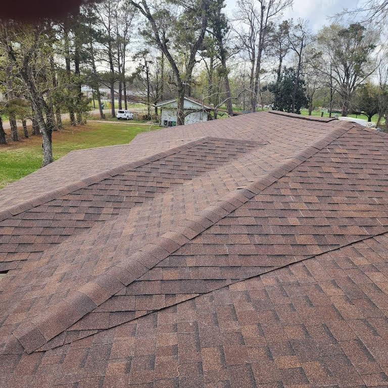 Slide of Flournoy and Sons Roofing