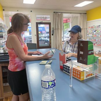 The Health Hutch - a woman and a woman at a counter - Vitamins & Supplements Near Me - Clare, Michigan The Health Hutch - a woman and a woman at a counter - Vitamins & Supplements Near Me - Clare, Michigan