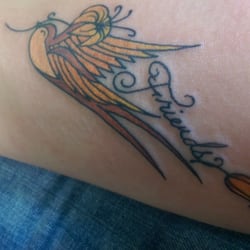 Gypsy King Tattoo - Harmey did awesome job on my bird/best friend tattoo i love it, he also did my awesome dream catcher with tribal horse tattoo..