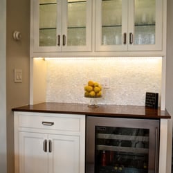 Affordable Built-ins - Built-in bar with overhead cabinet and Wine Fridge.