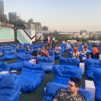 Melrose Rooftop Theatre - Overall layout, comfy lounge bean bags! - Outdoor Movies Near Me - West Hollywood, California Melrose Rooftop Theatre - Overall layout, comfy lounge bean bags! - Outdoor Movies Near Me - West Hollywood, California