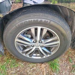 Yellow Roadside Assistance - This is one of my other tires just to give an idea of what the others look like. Didn't think to get a picture of the flat one.