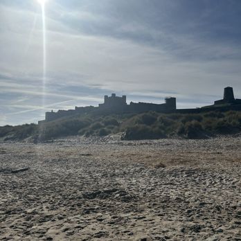 Highland Explorer Tours - Castle bamburgh from beach view - Tours Near Me - Edinburgh, EDH Highland Explorer Tours - Castle bamburgh from beach view - Tours Near Me - Edinburgh, EDH