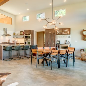 Inner Space Designs - Custom built home features custom items: dining chairs w/ Pendleton fabric & laced leather; island with leathered finished granite. - Interior Design Near Me - Seattle, Washington