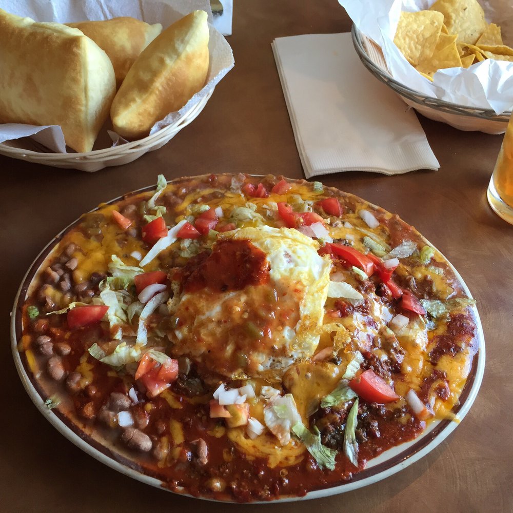 Sadie's - Stack enchiladas with egg added. - New Mexican Cuisine Near Me - Albuquerque, New Mexico Sadie's - Stack enchiladas with egg added. - New Mexican Cuisine Near Me - Albuquerque, New Mexico