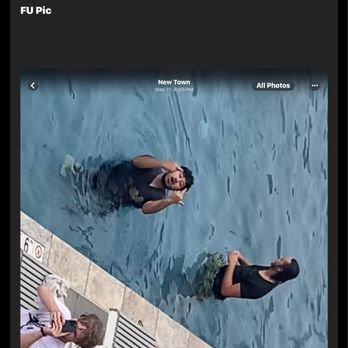 Manor On The Green - People swimming in the pool in street clothes, giving us the finger. - Apartments Near Me - Williamsburg, Virginia Manor On The Green - People swimming in the pool in street clothes, giving us the finger. - Apartments Near Me - Williamsburg, Virginia