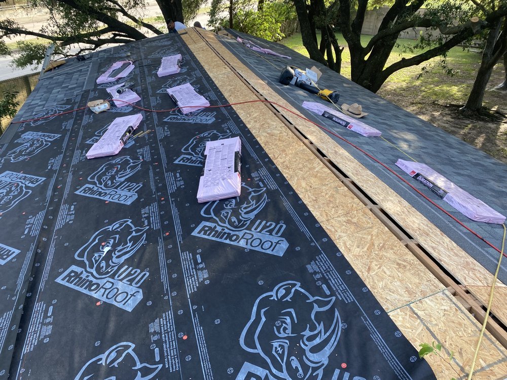 Slide of Natchez Roofing