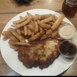 Schnitz - Large Chips.      Lemon and Herd coated Chicken Parma. My usual 2 sauces to dip in.   Chilli Aoli and BBQ. And a Brown Cream Soda Drink.