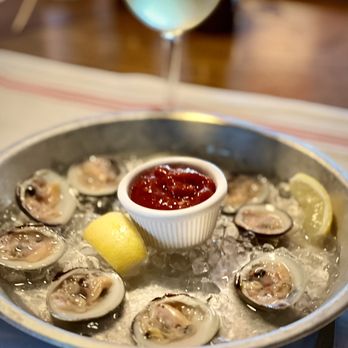 The Patio - a plate of oysters with a side of ketchup - New American Near Me - Westhampton Beach, New York The Patio - a plate of oysters with a side of ketchup - New American Near Me - Westhampton Beach, New York