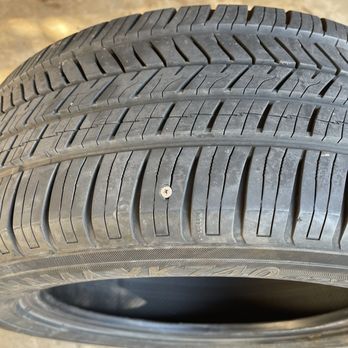 Caliber Auto Care - Tire with screw on top - Auto Repair Near Me - Tomball, Texas Caliber Auto Care - Tire with screw on top - Auto Repair Near Me - Tomball, Texas