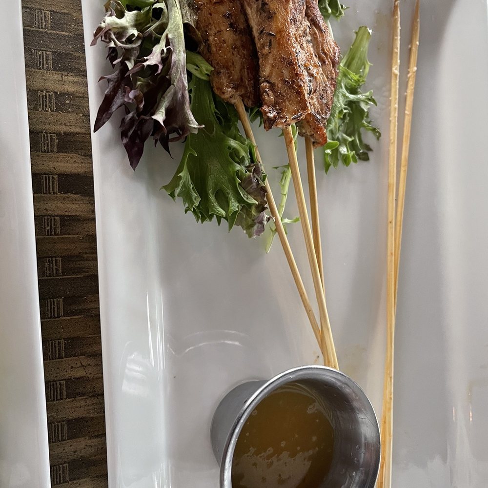 Havana's - Jerk chicken skewers appetizer with pineapple dipping sauce - Seafood Near Me - Carolina Beach, North Carolina Havana's - Jerk chicken skewers appetizer with pineapple dipping sauce - Seafood Near Me - Carolina Beach, North Carolina