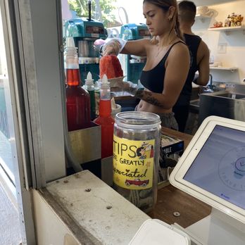 Waiola Shave Ice - The girl making our shaved ice bowls - Ice Cream & Frozen Yogurt Near Me - Honolulu, Hawaii